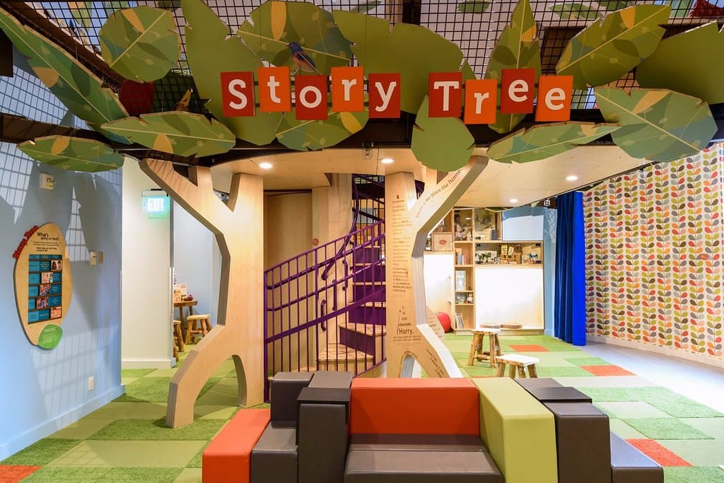 The Story Tree offers nooks and crannies for reading, make believe, and putting on a show.