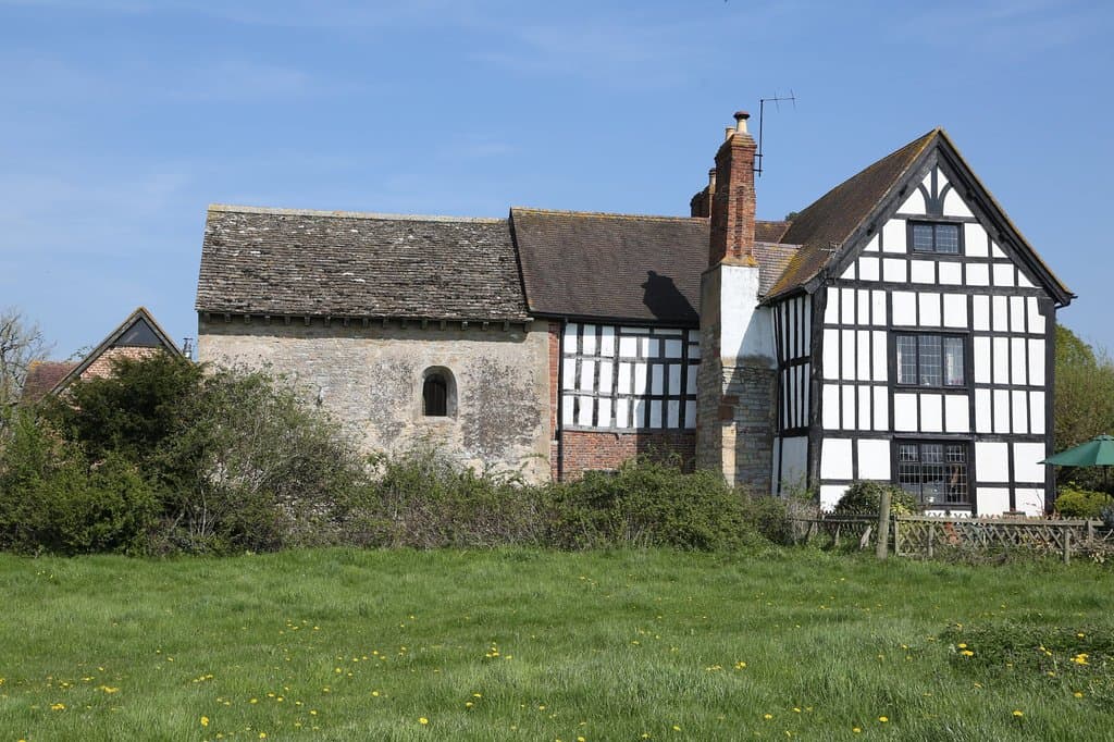 Odda's Chapel is the stone half of the building.