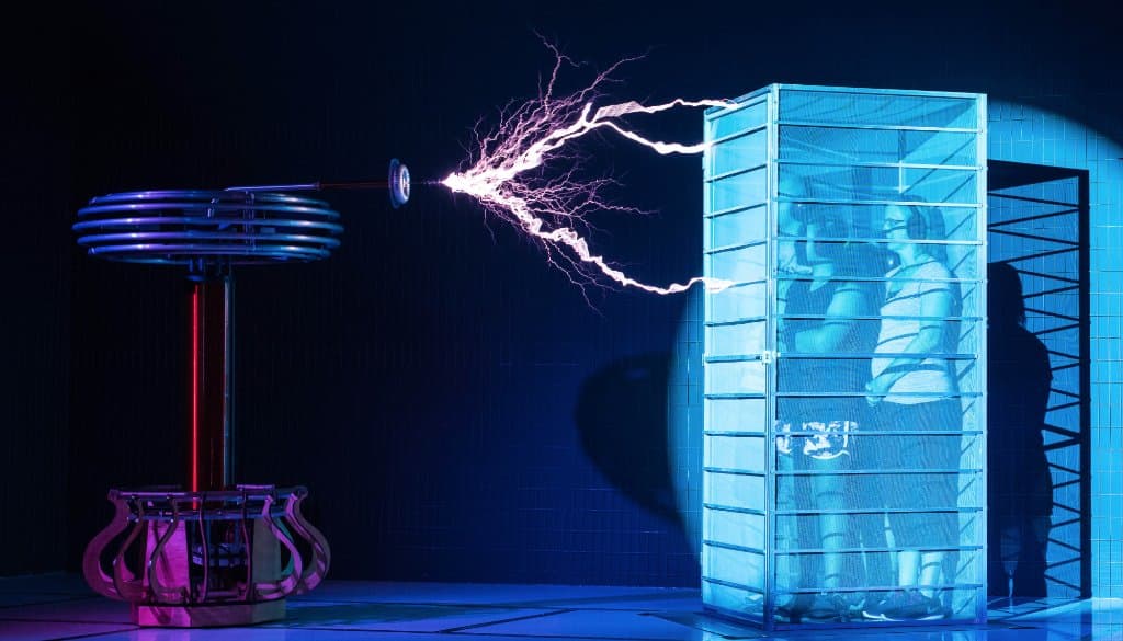 In Electricity Theatre, get up close to our Tesla coils from the safety of the Faraday Cage.