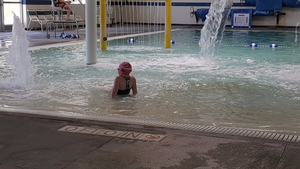 Enjoying a minute downtime before her lesson begins