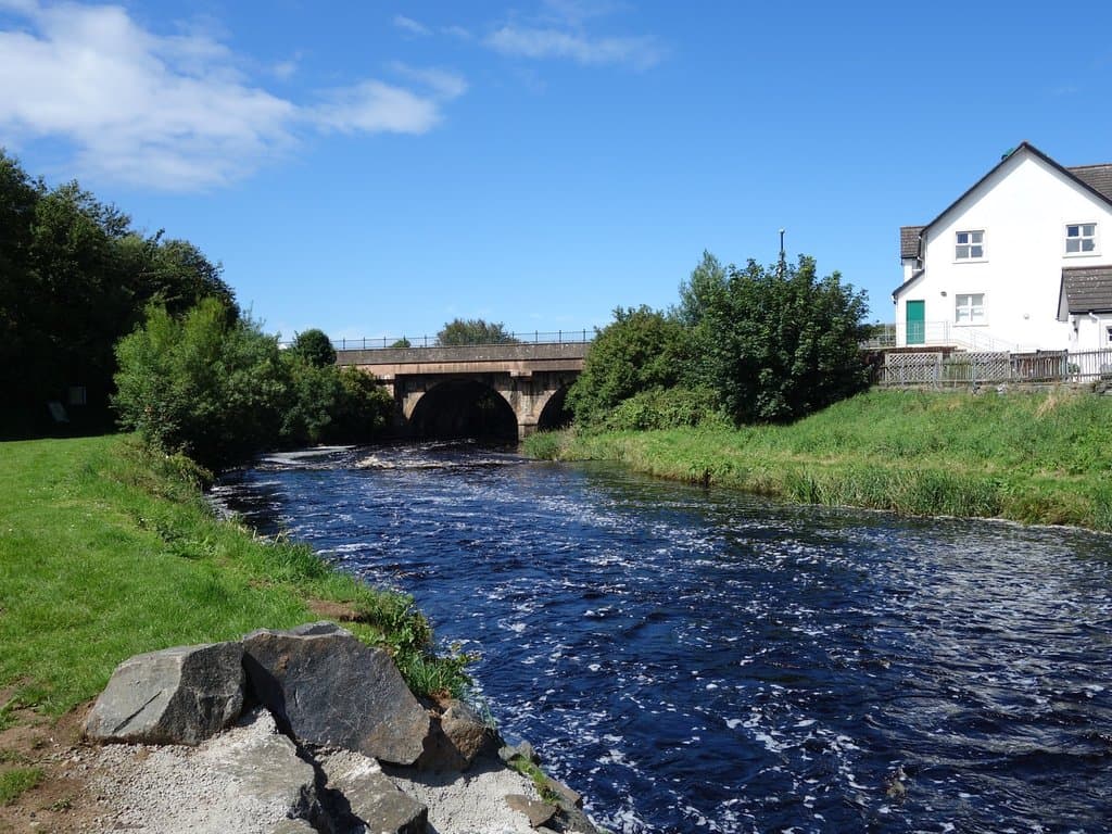 Very fast flowing peat coloured water