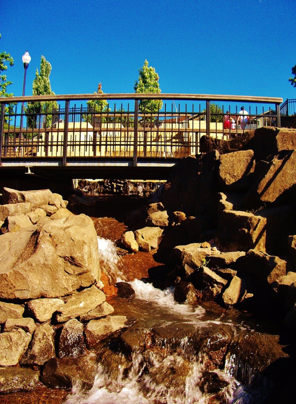 Looking up toward the street and entrance leading down into the park