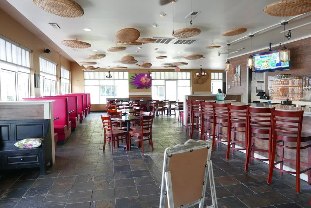 Love both the outside (quaint setting) and colourful interior decoration.