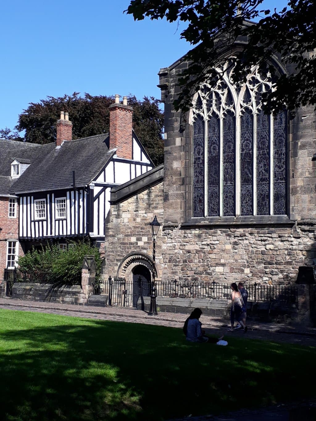 in front of large red building - part of old castle grounds??