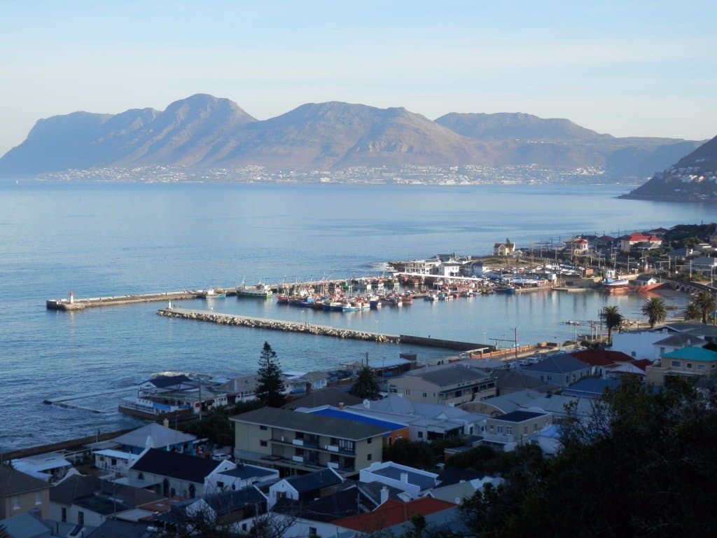Kalk Bay harbor and  the mountains of the Cape Peninsula from Boyes Drive