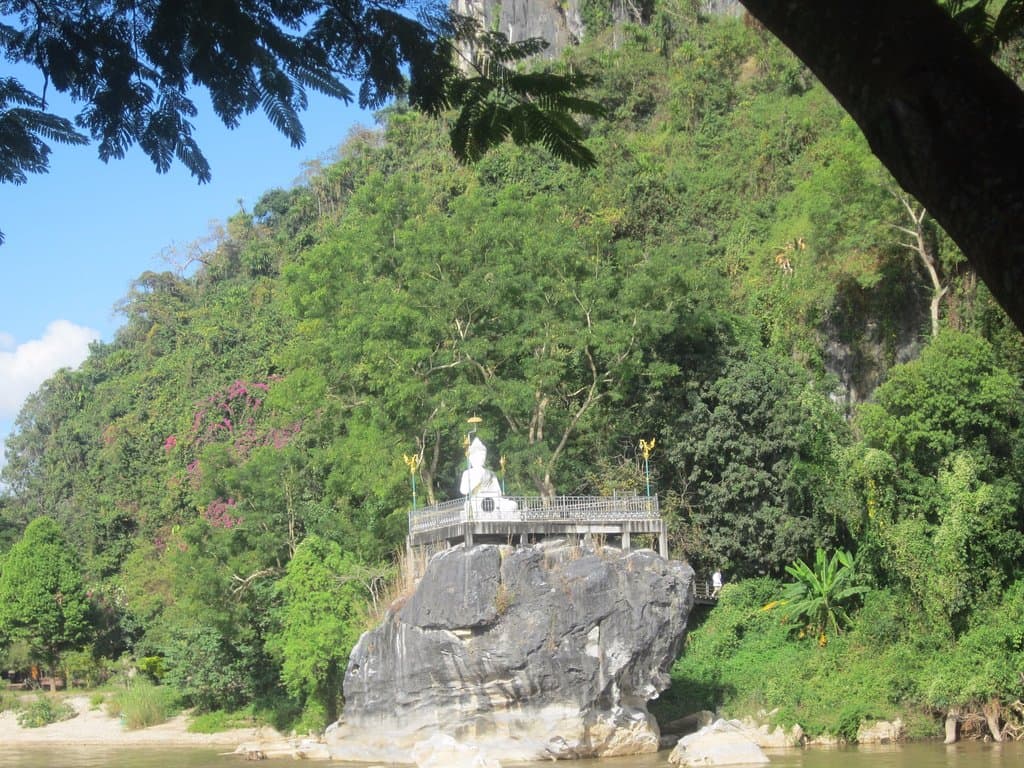 There is a Buddha figure on the opposite bank.