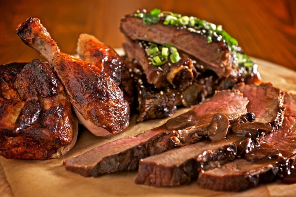 We use an authentic French open flame rotisserie for roasting our meats!