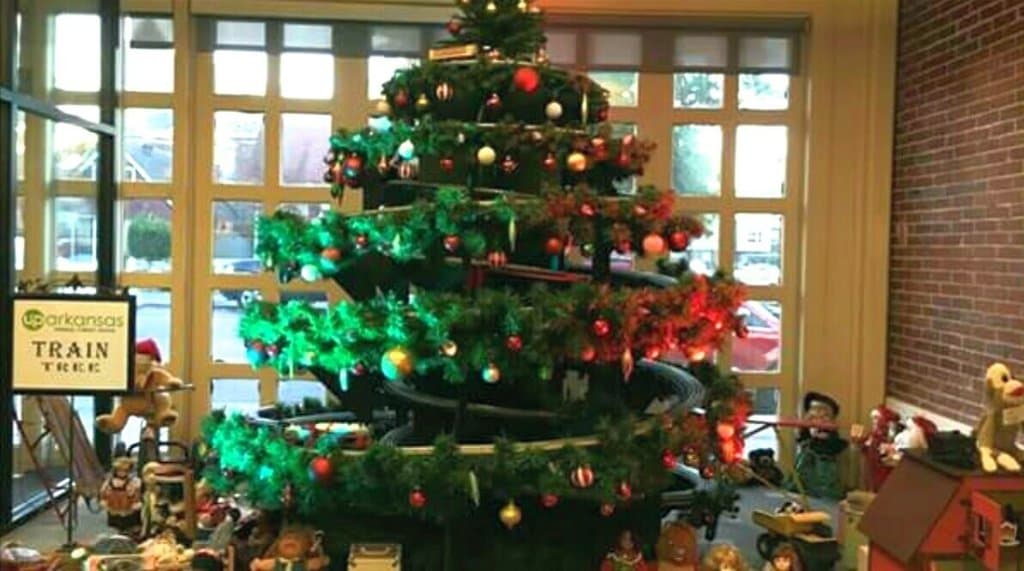 Train Tree at Christmas & St. Patrick's day; the front of the building