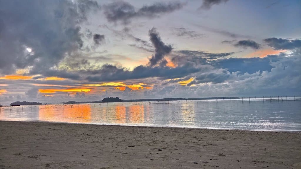 sunset at wandoor-beach - spoliled by clouds on the horizon