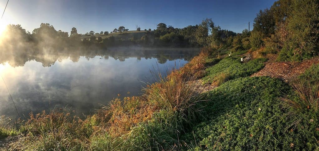 Mist rising from the water in the early morning