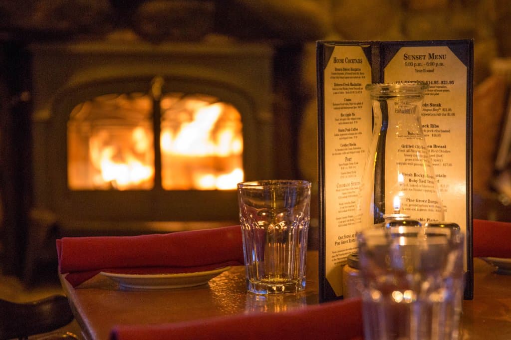 One of three fireplaces throughout the dining area to enhance the ambiance.
