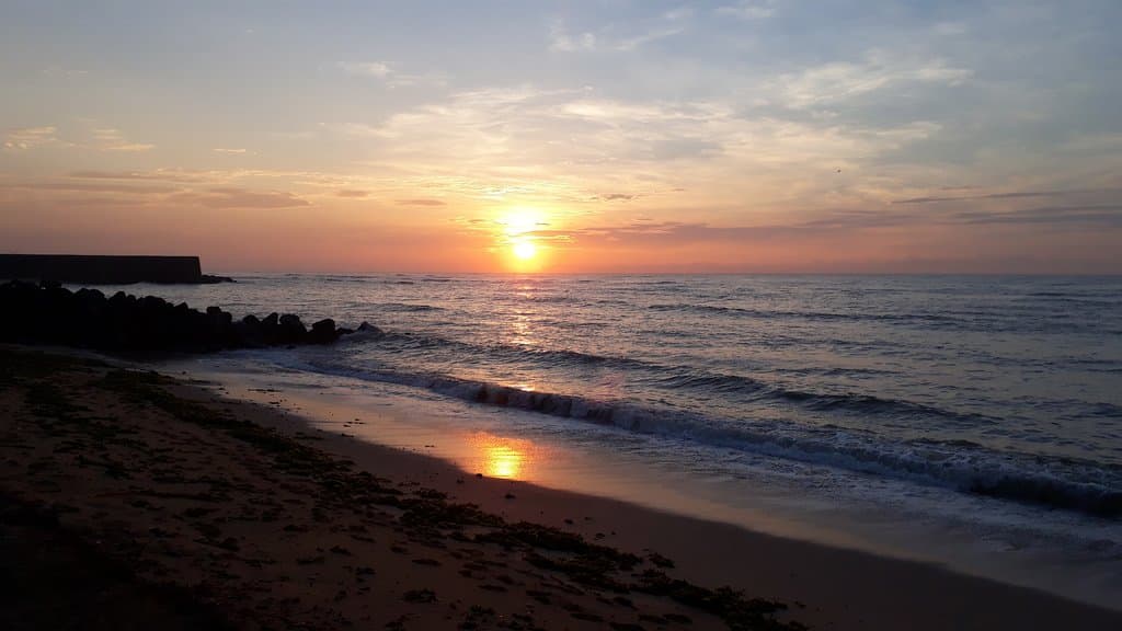 Sunrise at Vattakottai, cloudy