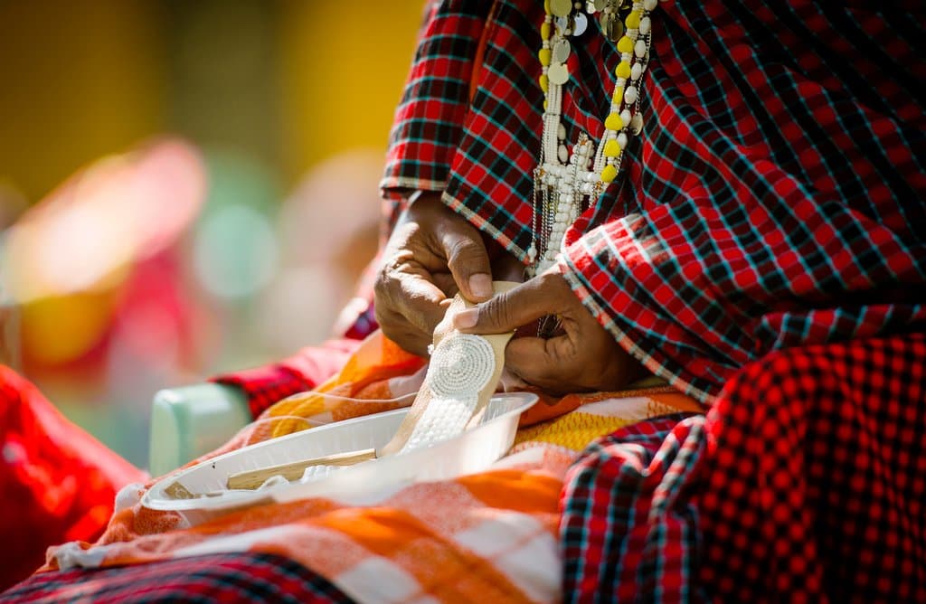 Maasai mamas beading at Sidai Center