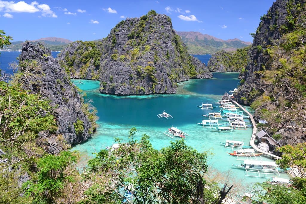 Kayangan Lake, dubbed the 'cleanest lake in the Philippines', is surrounded by a karst scenery o