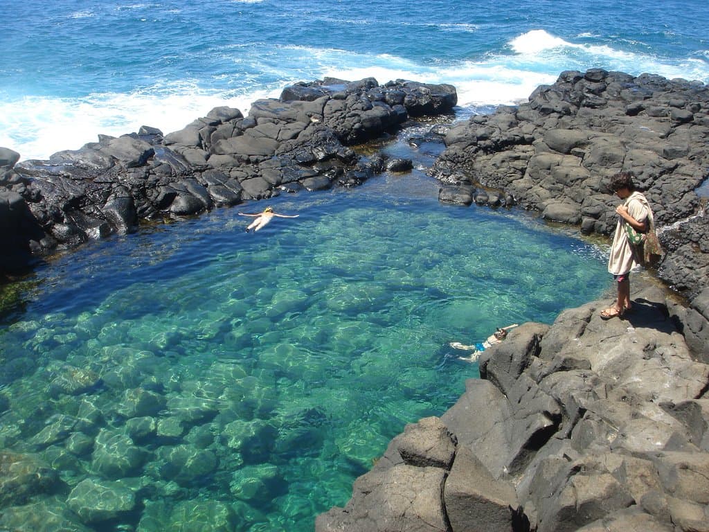 Amazing place to swim with waves crashing over lava rocks and sea turtles swimming near by.