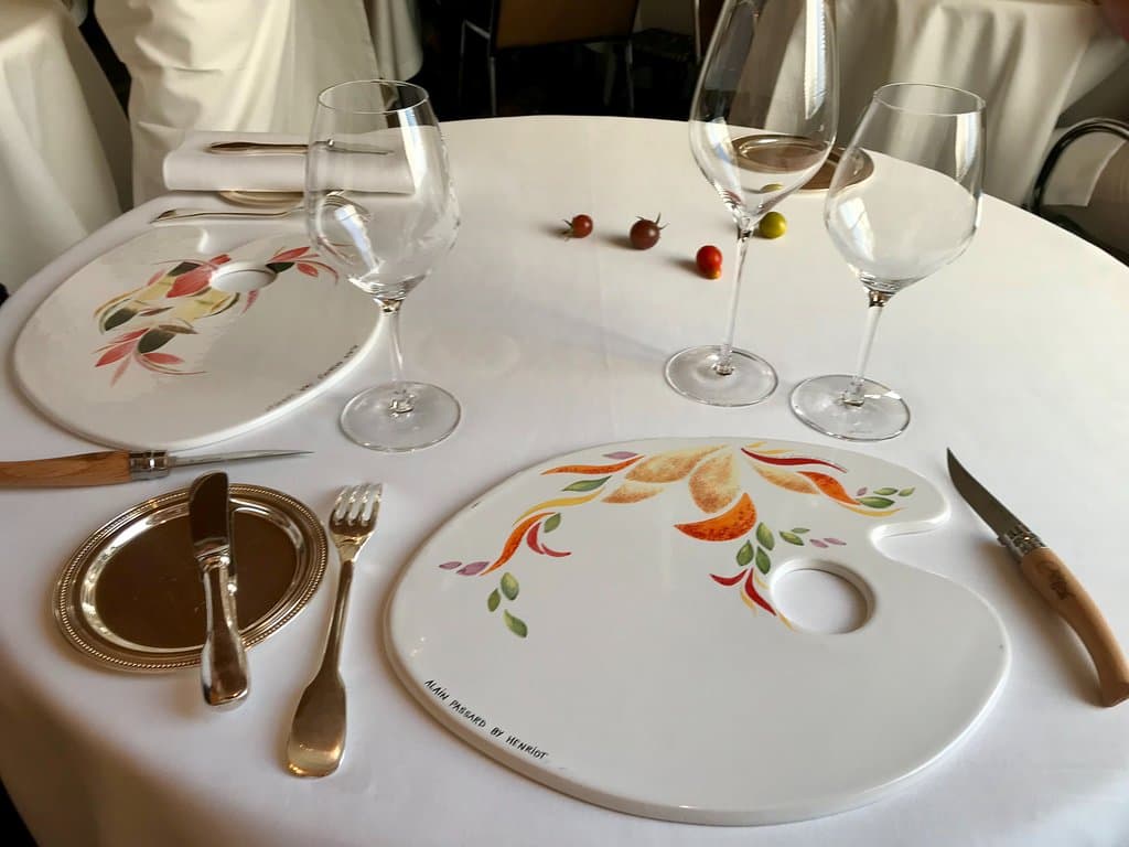 The table setting with chef-designed porcelain