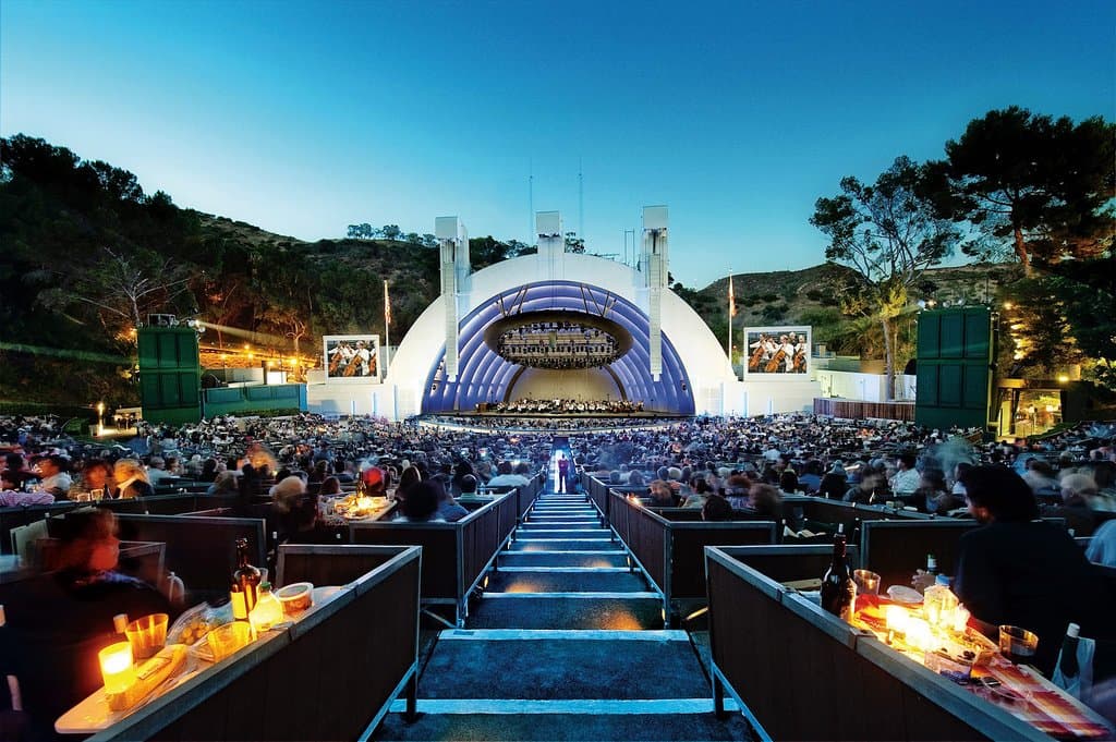 You’ll find three types of seating available for the Hollywood Bowl. Box Seats are the best, with canvas chairs in small groups surrounded by partitions. SuperSeats, in the middle of the audience, are stadium-style plastic with cup holders. The Bench Seats are near the Terrace boxes toward the back of the Hollywood Bowl.