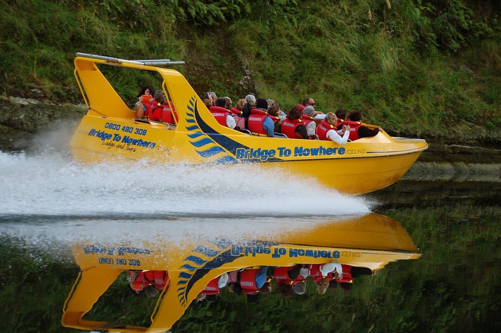 Amazing reflections on the Whanganui River as our boat takes clients back down to Pipiriki