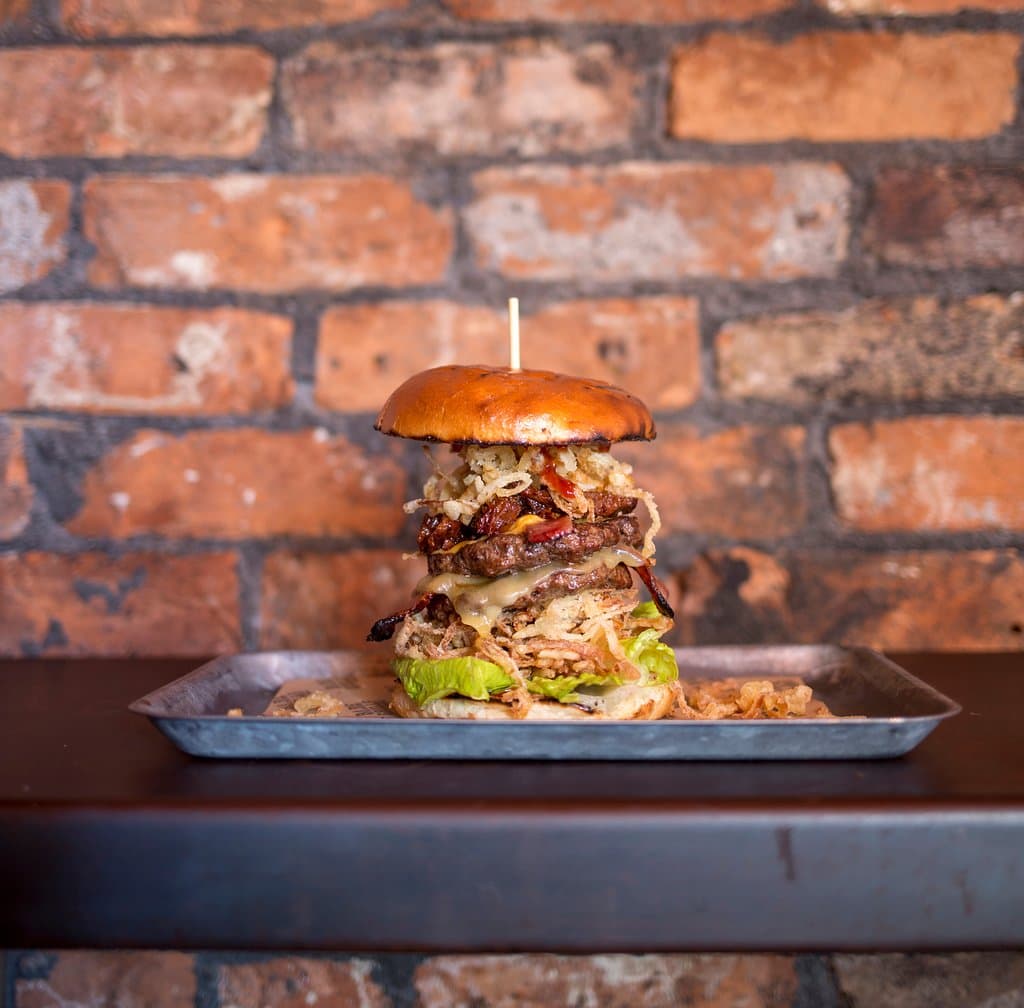 Bare Grill burger
Double beef patties, topped with bacon, cheese, lettuce, tomato, crispy onions