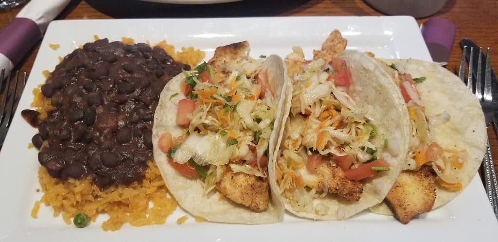 Signature Fish Tacos, Chilaquiles, Omelettee and Oatmeal.