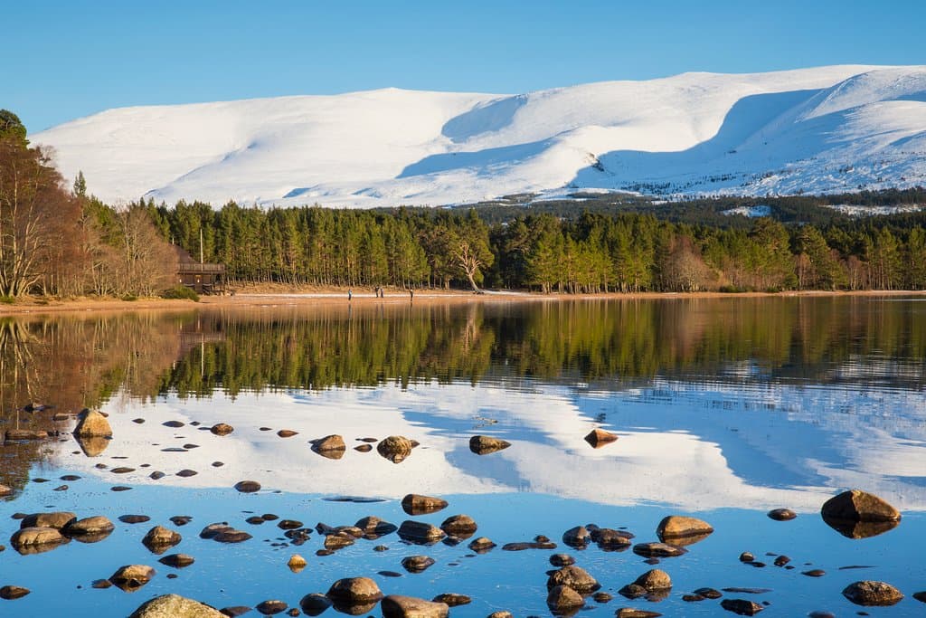 Our final recommendation for a lochside wander in the Cairngorms National Park is this unmissable circuit around Loch Morlich near Aviemore. A postcard-maker's dream, the sandy shores of Loch Morlich frame the stunning mountain range of the northern Cairngorms behind. Several way-marked trails tempt you through the pine forests, with plenty of opportunities to emerge onto the idyllic beaches and dabble your toes in the loch. The circuit should take you 1.5 - 2 hours.