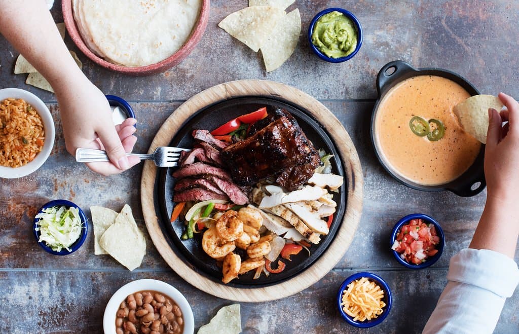 Fajita fiesta with an order of con queso