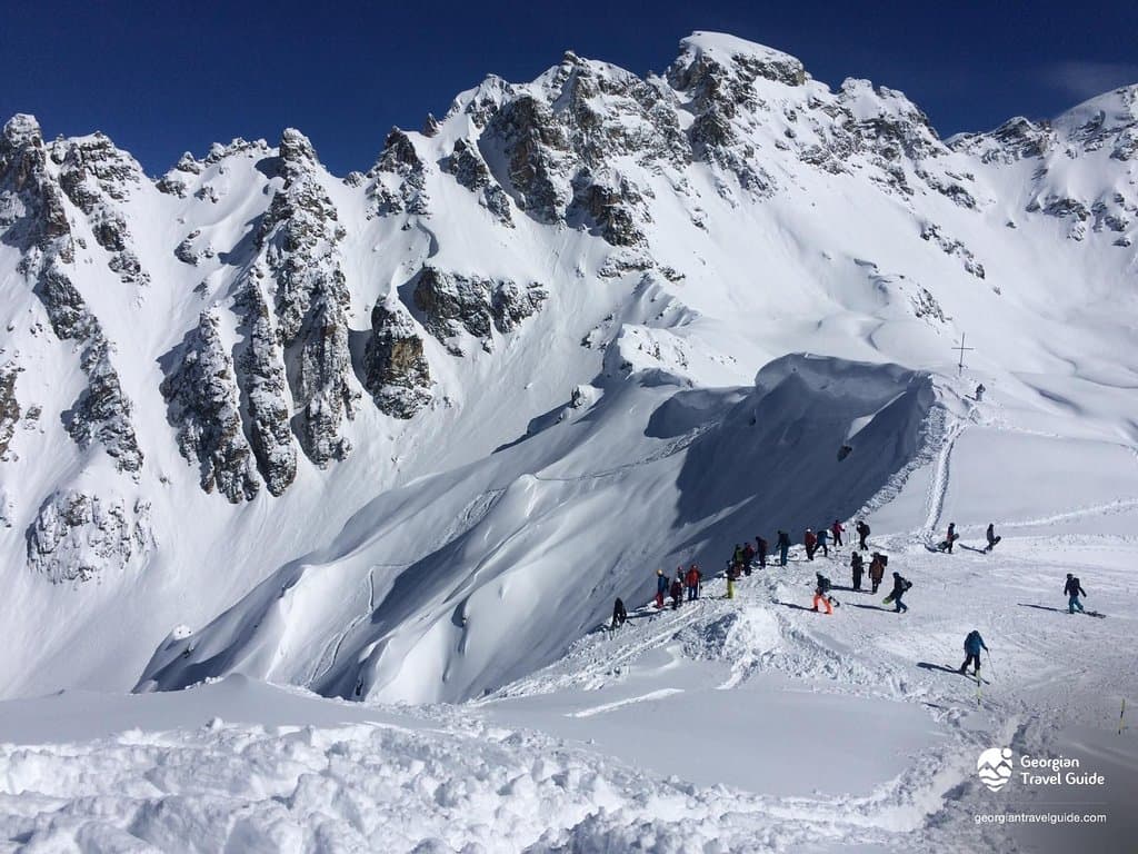 Tetnuldi is a prominent peak in the central part of the Greater Caucasus Mountain Range, located in the Svaneti region of Georgia. According to most sources, Tetnuldi is the 10th highest peak of the Caucasus. The slopes of the mountain are glaciated generally above the 3,000 meters (9,840 ft) line. The most prominent glacier of the mountain is called Adishi. It was first climbed by Douglas Freshfield in 1896. New ski resort in Tetnuldi was opened during 2015-2016 for the winter season.
