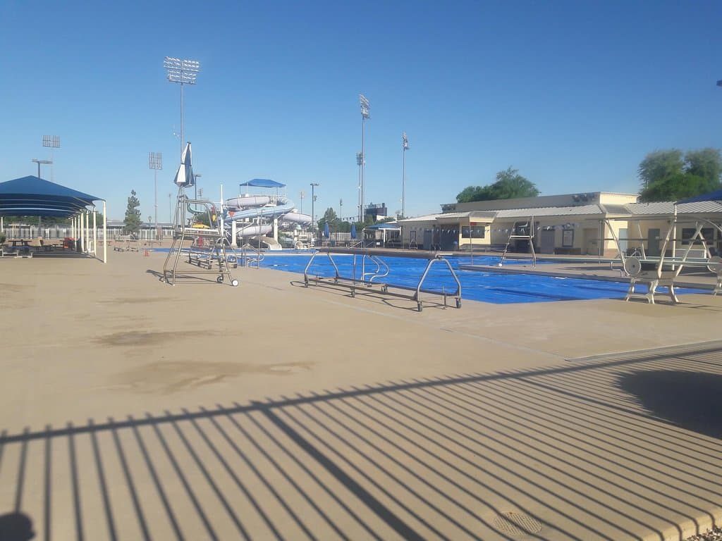 2 diving boards & covered seating . . .