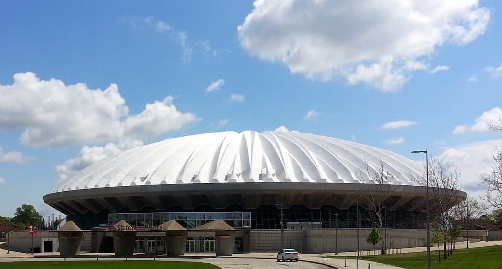 a view of the main entrance of the State Farm Center from the west