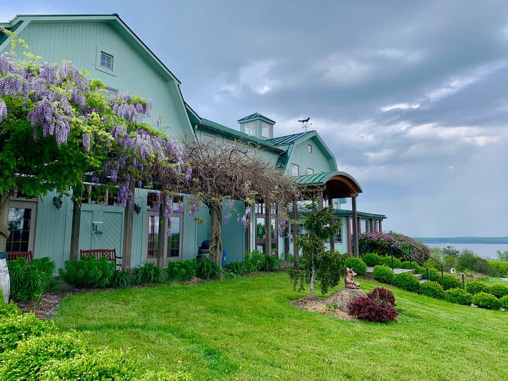 Side view of beautiful building with lake in the background