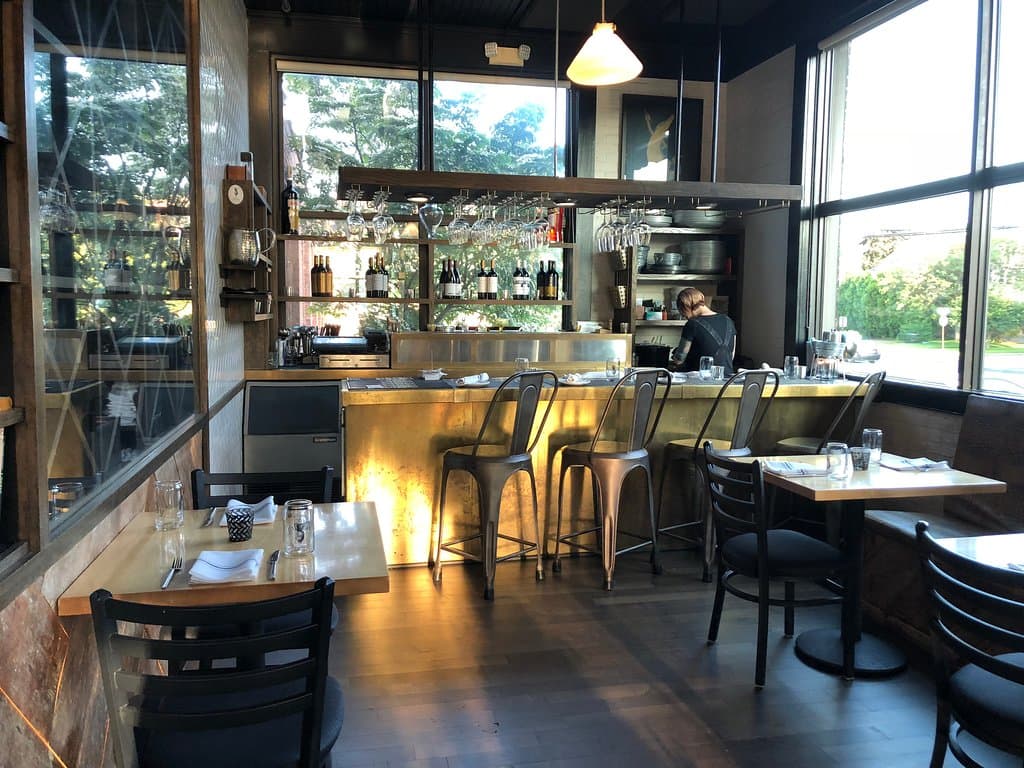 The Revelry - downstairs tables by seafood bar