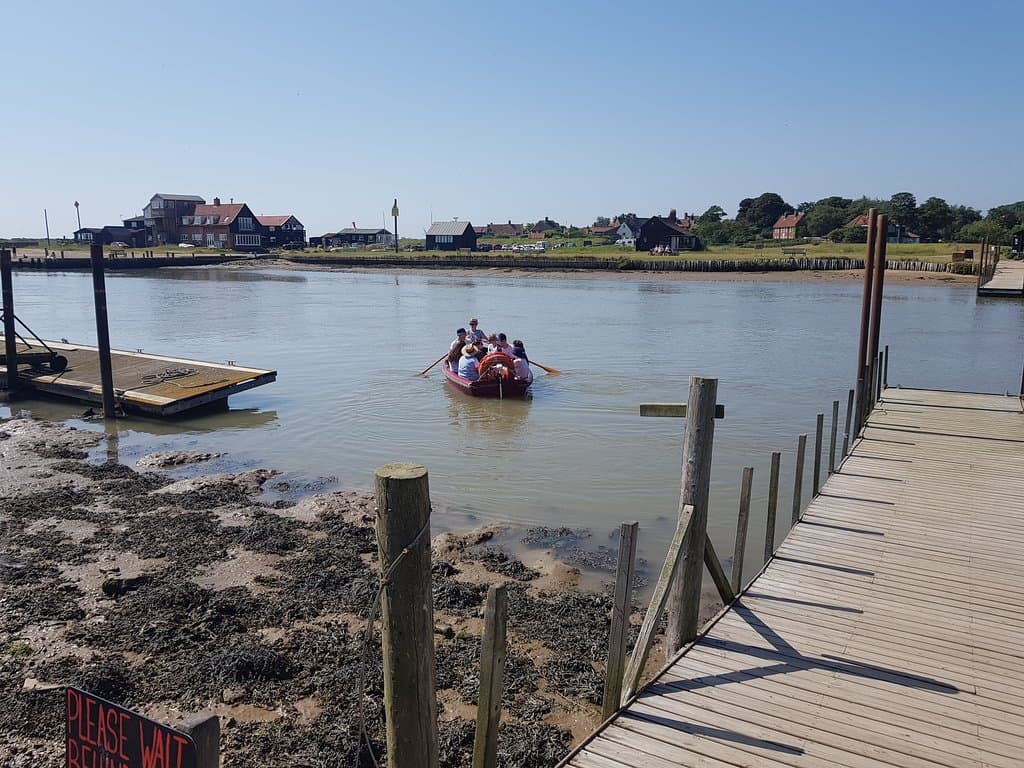 Rowed by hand against a strong current.