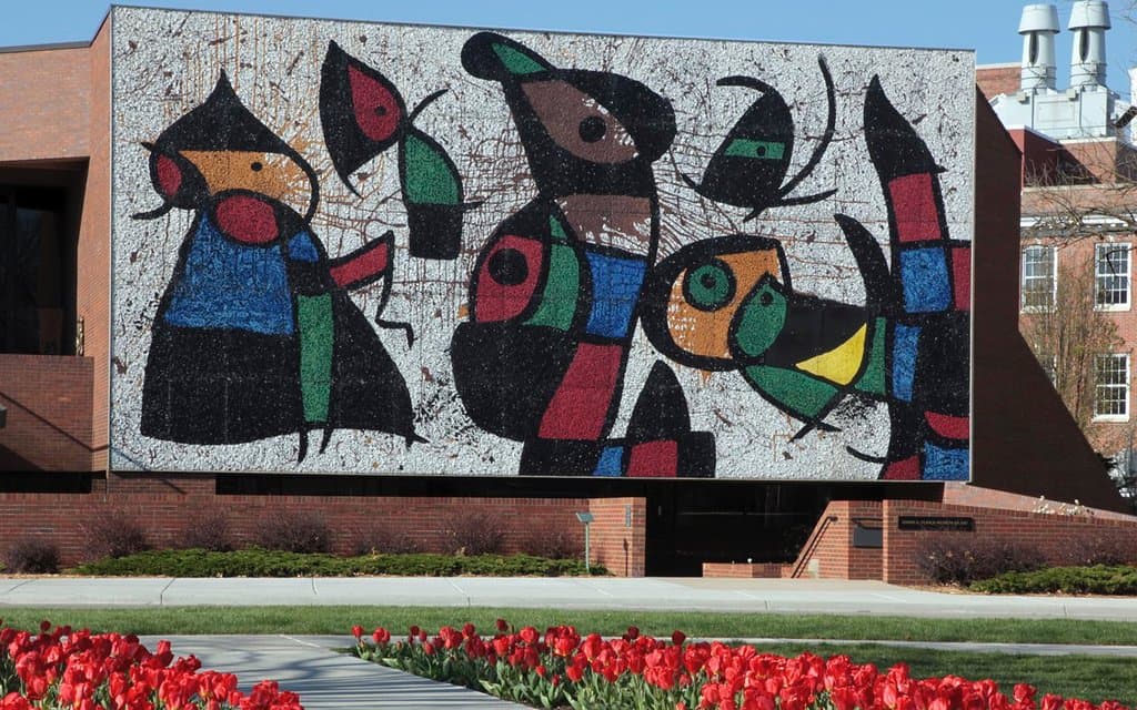 Joan Miró's mural, "Personnages Oiseaux," graces the entrance of the Ulrich Museum of Art on Wichita State University's campus.