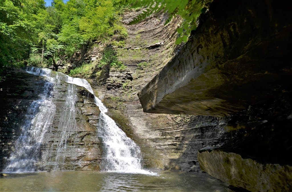 The second falls at Grimes Glen. If you look closely before you reach the swimming hole, off to the right, just a little above eye level, you will see inscribed in a narrow flat rock "P.S. GRIMES 1847" as seen in this photo taken by Phil Herzog.