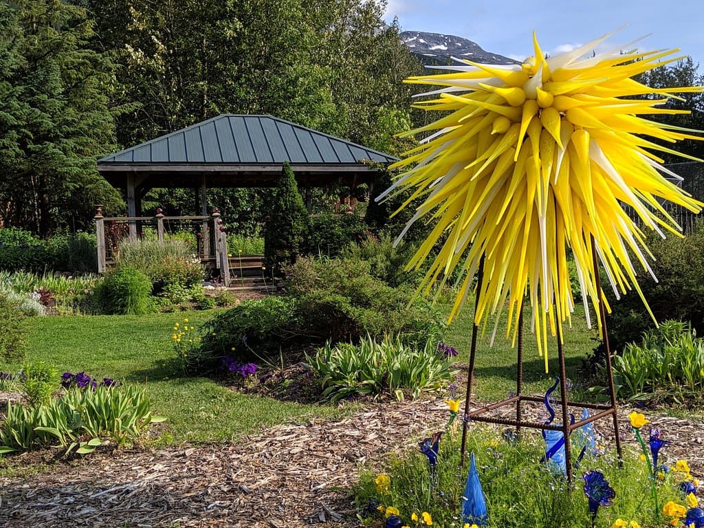 Glass Sculptures are intermixed throughout the Garden. This is "the North Star" of our Alaska themed Garden bed.