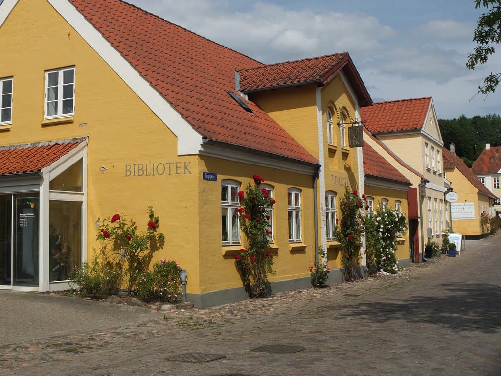 The rose covered buildings.