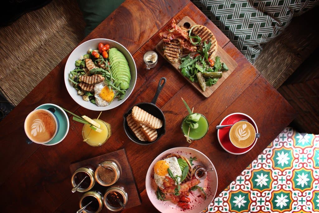 Brunch at Inside Cafe: Our classic Grilled Cheese Sandwich, The Sunny Side French Toast, Veggie Bowl with Chicken, Mimosa, Green Juice & Coffee