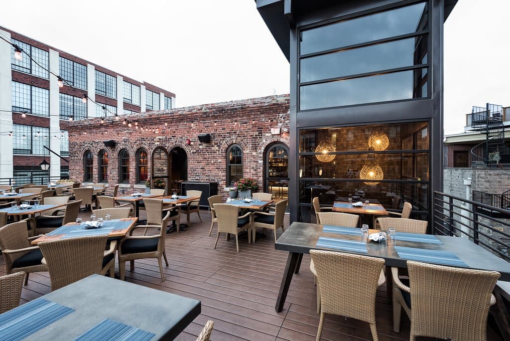 Just steps away from Mass Ave. Livery features one of the only rooftop bars in Indianapolis.