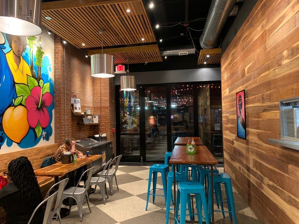 A comfort food establishment with both Puerto Rican flair and African influence graduating to flashy brick and mortar restaurant from food truck chic.