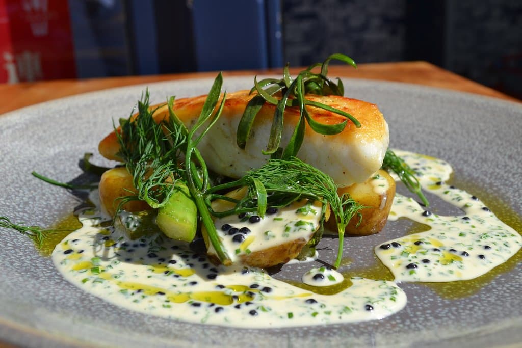 Halibut, caviar veloute, asparagus, sea vegetables.