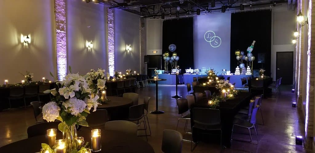 Real candle flames make all the difference. Also notice the up lighting and custom logo projection at the North Garden Theater in St. Paul, Minnesota!