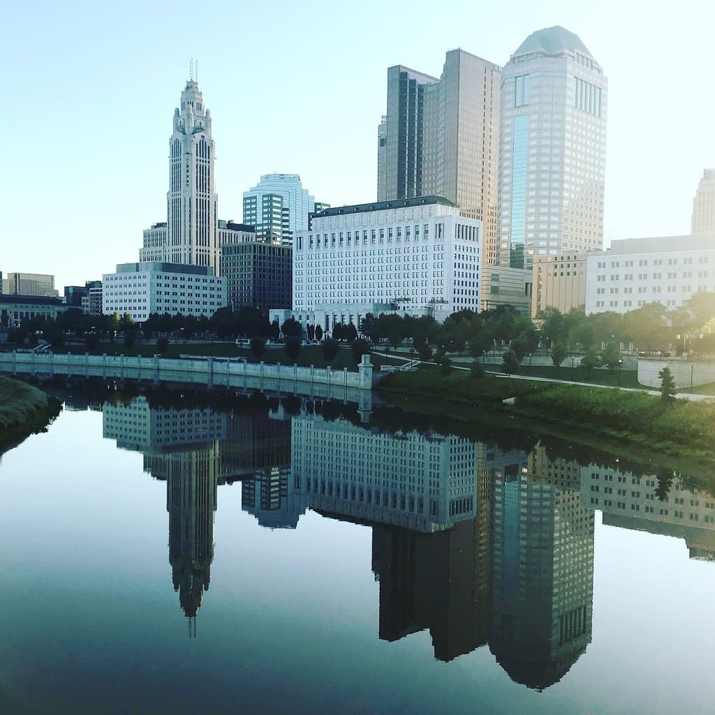 The Thomas J. Moyer Ohio Judicial Center reflected in the Scioto River. 