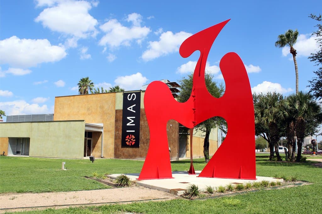 Find the IMAS at Nolana Avenue and Bicentennial, visible with the Dactyl by Stuart Kraft (1983).