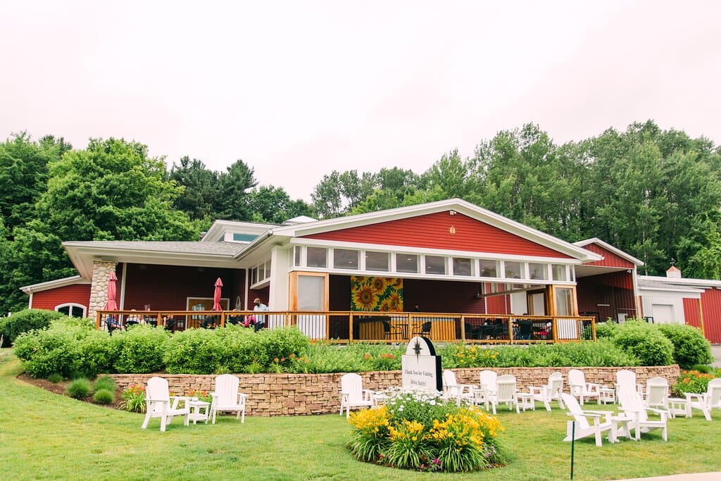 Terrace Patio and front lawn at the tasting room at Black Star farms Suttons Bay