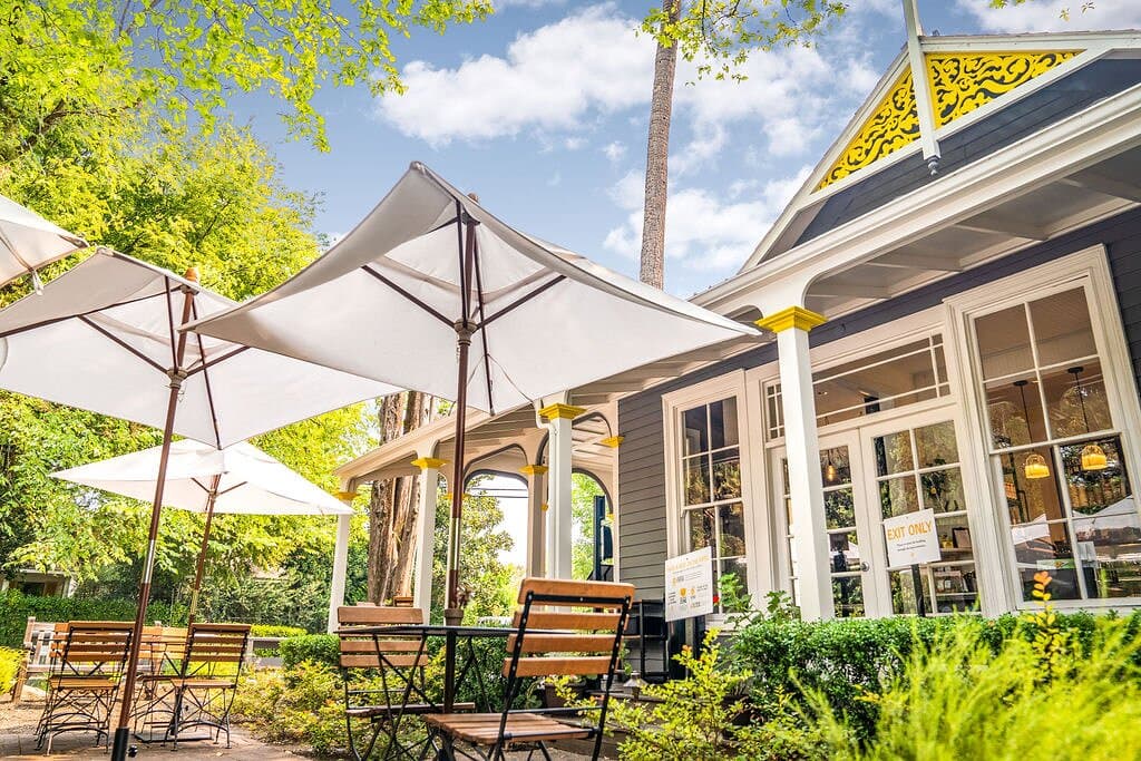 Enjoy our charming outdoor patio with a great view of this landmark historic 1862 property 