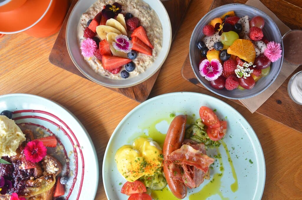 Breakfast looks good!  Clockwise - Housemade Bircher, Fruit Salad, Keto Brekkie and Berry French Toast from the Summer Menu 2020/2021.
