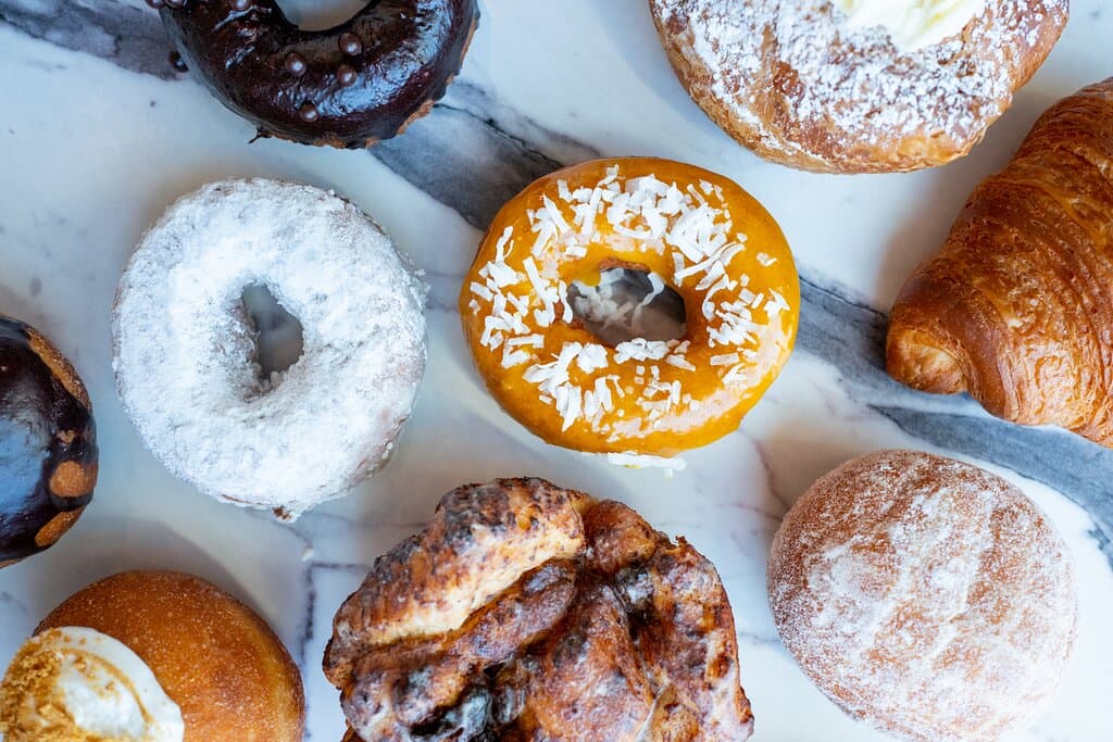 an assortment of pastries, including donuts