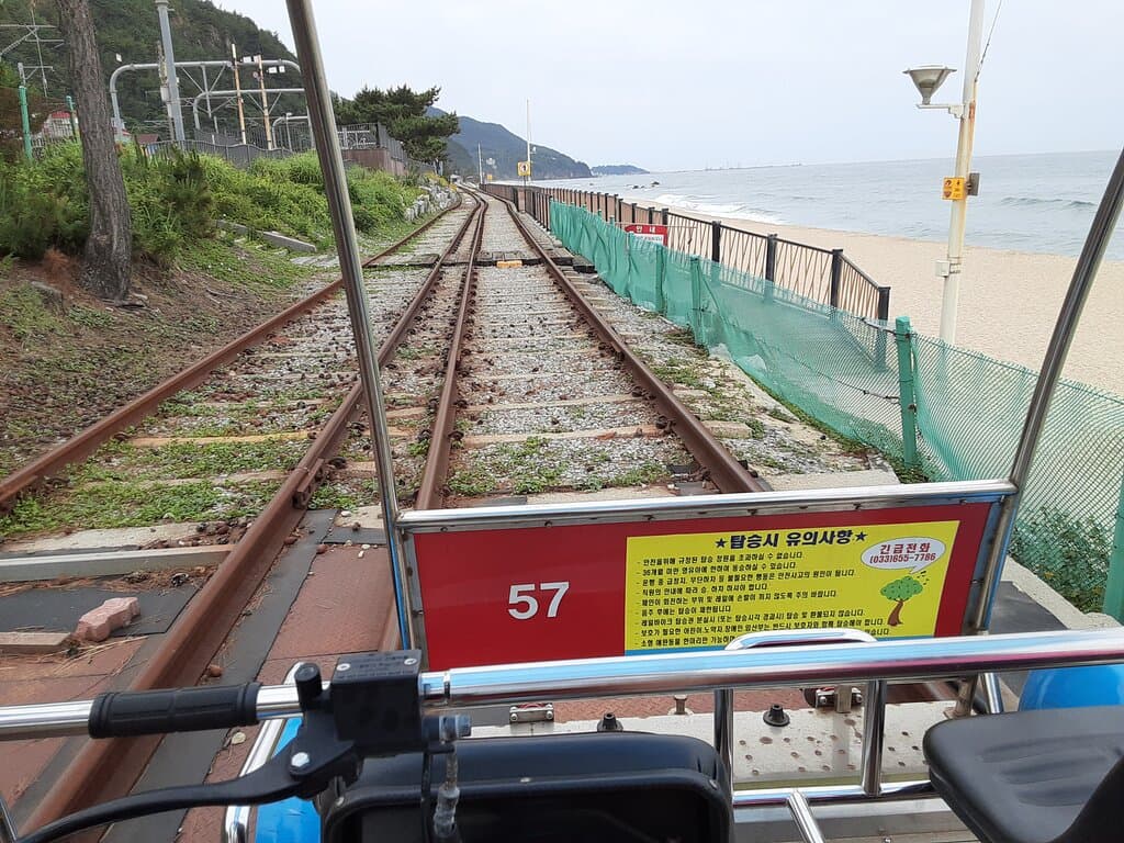While we were at Jeongdongjin we took the rail bike ride. We enjoyed it, but was disappointed that we couldn't pedal. The reason given was because there were others behind us, so we had to use the electric motor.