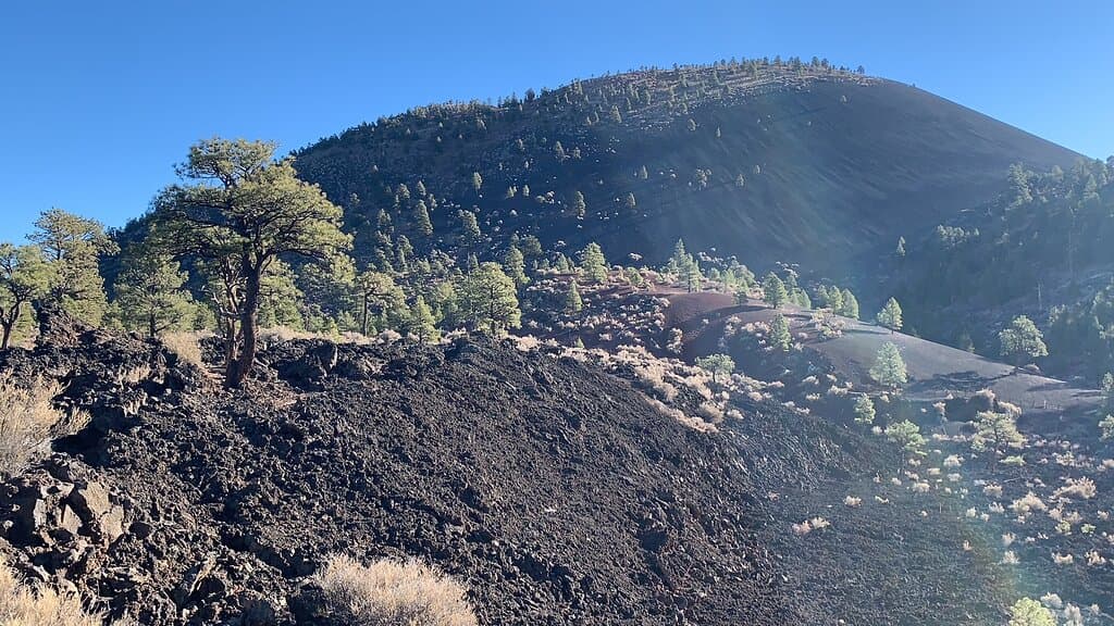 The exposed lava flow in front of the crater