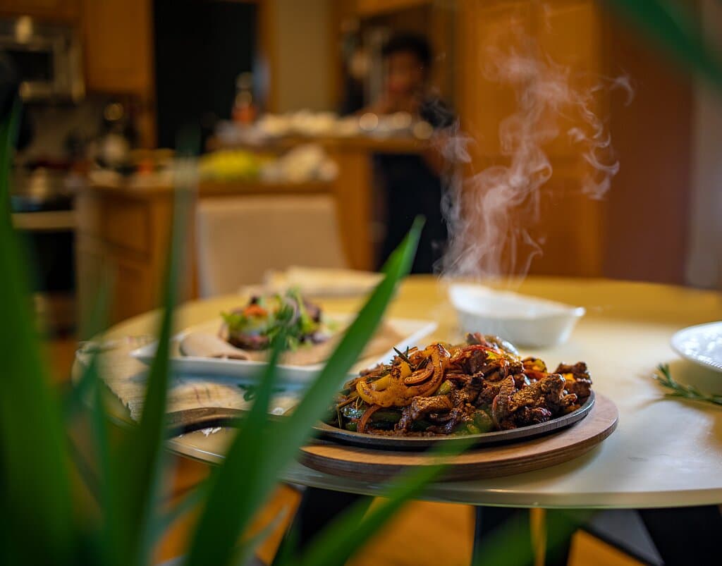 Strips of tender beef marinated in house-blended spices and onions cooked over an open flame.